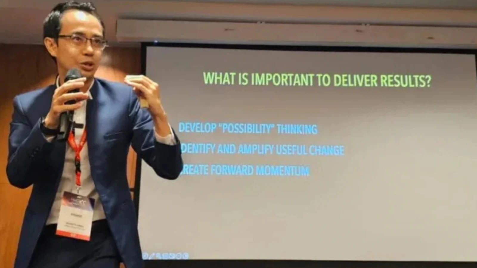 Leadership speaker in Singapore Kenneth Kwan presenting practical strategies to corporate leaders